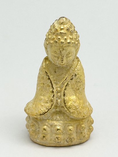 พระกริ่งปวเรศ เนื้อโลหะสีทอง