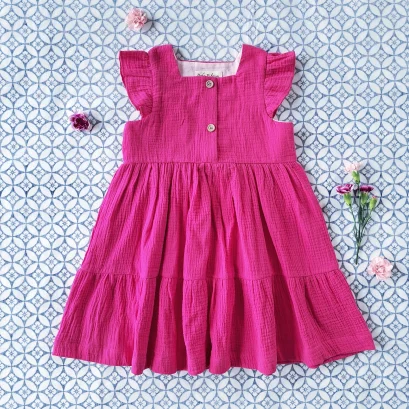 ชุดกระโปรงกระดุมหน้า แขนระบาย 100 % คอตตอนมัสสินเนื้อนิ่ม สีชมพูบานเย็น