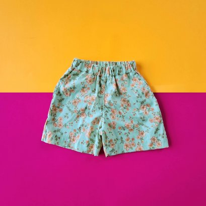 เด็กชาย-หญิง กางเกงเอวยางยืด มีกระเป๋าล้วงข้าง 100%คอตตอนพิมพ์ลายดอกไม้บานสีเขียว