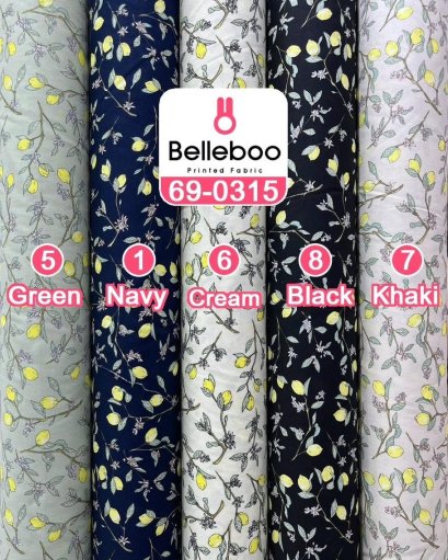 Cotton fabric printed with a small lemon-and-stem pattern.