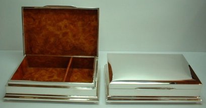 Silver Cigarette Box with Hinged Lid.