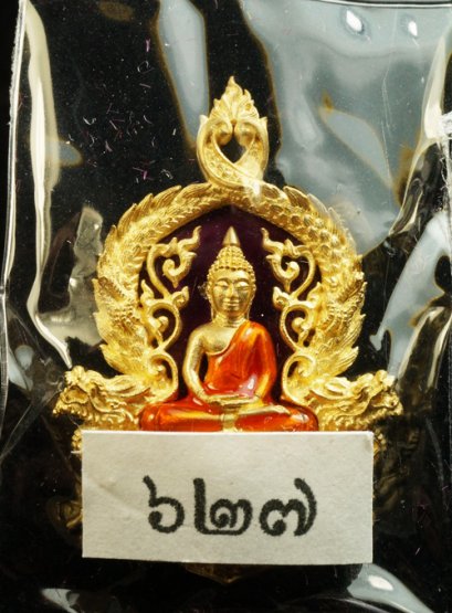 เหรียญฉลุเจริญพร หลวงพ่อโสธร พิมพ์เล็ก เนื้อทองระฆัง ลงยาสีม่วง ฝังเพชรแท้ 3-5 เม็ด หมายเลข 627 (โทรถาม)