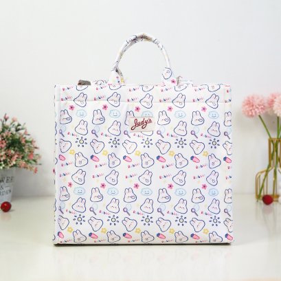 Emily ผ้ากันน้ำพิมพ์ลาย กระต่ายแครอทพื้นครีม