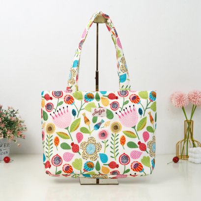 BUNBUN ผ้ากันน้ำ ทับทิมพื้นครีม