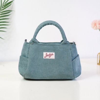 อุ้มปุ้ม (เล็ก) ลายลูกฟูกเขียว