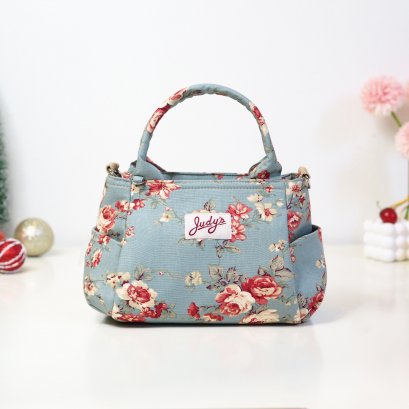 อุ้มปุ้ม (เล็ก) ลายดอกส้มเขียว