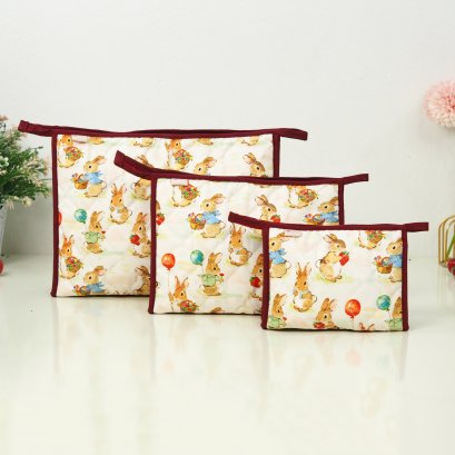 กระเป๋าเครื่องสำอางสามอนงค์ กระต่ายลูกโป่งพื้นครีม