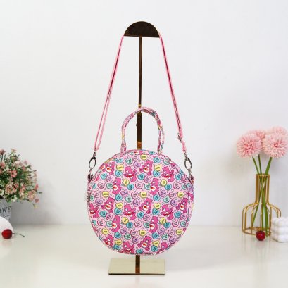 กระเป๋าวงกลม ผ้ากันน้ำลาย หมี care Bears พื้นชมพู