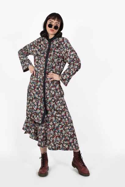 เดรสยาวคอปีน ทรงป้าย ชายระบายเฉลียง ลายพิมพ์ดอกไม้ - ORIENTAL BREEZE WRAP DRESS (BLOSSOM FLOWER)