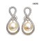 Approx. 10.0 mm, Gold South Sea Pearl, Dangle Pearl in Infinity Stud Earrings