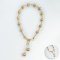 11.81 - 13.34 mm, Gold South Sea Pearl, Station Pearl Beads Necklace with Bow Dangle Twin Pearl Pendant