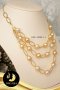 สร้อยคอไข่มุกระย้า South Sea สีทอง 3 สาย ความยาวประมาณ 19" ไข่มุก South Sea สีทอง ทรงบาร็อค ขนาด 8-9 mm เกรด AA ตัวเรือนห่วงใหญ่ 3 สาย ตะขอก้ามปูและสร้อยโซ่ เงินแท้ 92.5 ชุบทอง / ส728
