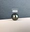 แหวนโบว์ไขว้ประดับเพชร ไข่มุกตาฮิติน้ำเค็มคัดเกรด สีเทาและดำ ทรงกลม ขนาด 10.82 และ 10.90 mm เกรด AA+ Luster ดีเยี่ยม ตัวเรือนแหวน เงินแท้ 92.5 ชุบทองคำขาว ประดับเพชร CZ