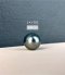 แหวนโบว์ไขว้ประดับเพชร ไข่มุกตาฮิติน้ำเค็มคัดเกรด สีเทาและดำ ทรงกลม ขนาด 10.82 และ 10.90 mm เกรด AA+ Luster ดีเยี่ยม ตัวเรือนแหวน เงินแท้ 92.5 ชุบทองคำขาว ประดับเพชร CZ