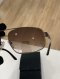 Prada SUNGLASSES BROWN