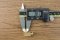 ข้อต่องอ 90° ทองเหลือง (เกลียวนอก x ตาไก่เสียบสาย) M4x0.7 x 4 mm