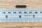 น็อตตัวหนอนดำแข็ง M5x20 เกรด 12.9 ปลายทองเหลือง 2.5x1.2 mm