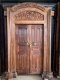 British Carved Door with Brass Handle and Lock Bar