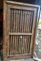 Antique Wooden Window with Iron Bars