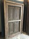 Antique Wooden Window with Iron Bars