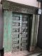 L70 Antique Green Door with Stone Basement