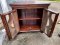 Glass Sideboard with Tribal Carving Decor