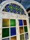 Colorful Arch Door with Colonial Carving