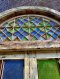 Colorful Arch Door with Colonial Carving