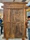 Hard Wood Door Covered with Brass Decor on Metal