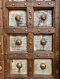 Hard Wood Door Covered with Brass Decor on Metal