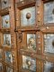 Hard Wood Door Covered with Brass Decor on Metal