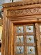 Hard Wood Door Covered with Brass Decor on Metal