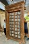 Hard Wood Door Covered with Brass Decor on Metal