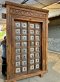 Hard Wood Door Covered with Brass Decor on Metal