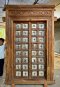 Hard Wood Door Covered with Brass Decor on Metal