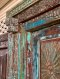 Front Door Decor with Antique Carving and Brass Sun