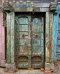 Old Door with Brass Flowers