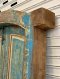 Blue Arched Door with Classic Paneling