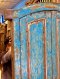 Blue Arched Door with Classic Paneling