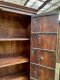 Dark Wooden Cabinet with Brass Decor