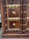 Dark Wooden Cabinet with Brass Decor