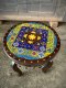 Round Wood Table with Ceramic Decor