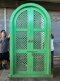 ประตูไม้ระแนงทรงโค้งมินิมอลสีเขียว