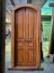 British Colonial Dark Wooden Arch Door