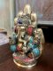 Brass Lord Ganesh Sitting on a Hand