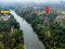 Resort Investment by the River! This plot has everything you need!! For sale: Red Garuda Title Deed land with existing structures, over 15 Rai total area (including accreted land). Fronting the main road and directly next to the river