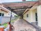 Live comfortably or run your business — This house does it all! For sale: a spacious 2-storey detached house on Ban Phaeo–Phra Prathon Road (Highway 375), Samut Sakhon. With 174.4 sq.wah of land and 260 sq.m. of usable space, this home features 4 bedrooms