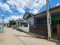 For Sale - One-Story Twin House in Sukhawadi Soi, Sung Noen, Nakhon Ratchasima. The house is situated on a 37 square wah plot and features 2 bedrooms and 2 bathrooms, with a usable area of 148 square meters. The spacious backyard is ideal for those who wi