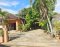 Peaceful, shady, close to the sea, near the airport, and close to convenience stores. Single house for sale, 105 sq.wah, located at KM.10, Phlu Ta Luang, Sattahip District, Chonburi Province.