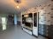 Corner Townhome with More Space Than Others Beautifully decorated and move-in ready — just bring your clothes! Conveniently located near a school, fresh market, and Wat Nong Ri.